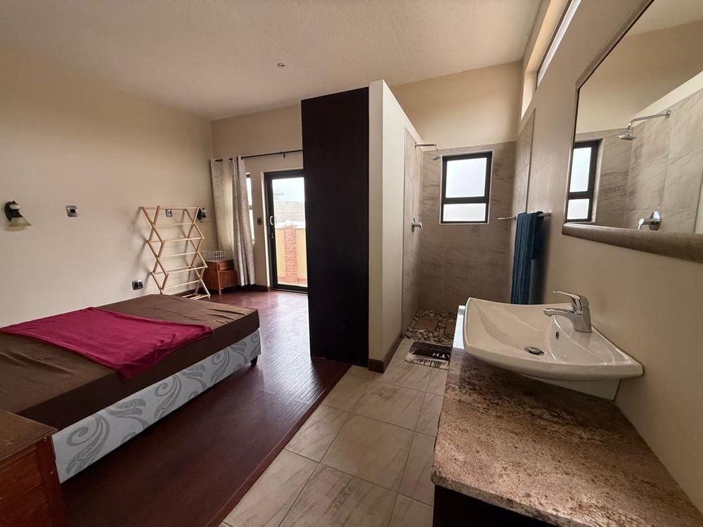 Ground floor, bedroom one, built-in cupboards and en-suite bathroom