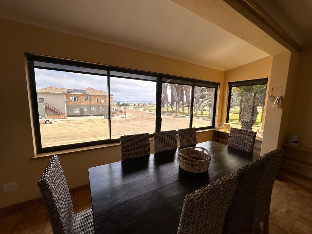 Lounge with sea views from Duplex flat