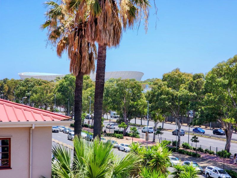 Sun Kissed Two Bedroom Apartment with Balcony and Garage - Photo 10