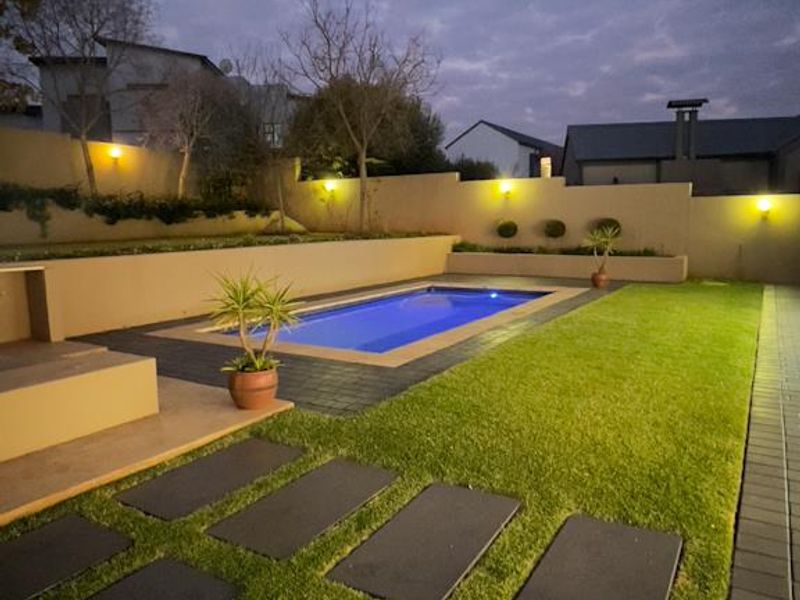 Hilltop Haven | Modern Multi-Level Marvel with Solar Power, Blueline Kitchen & Entertainer’s Garden - Photo 8