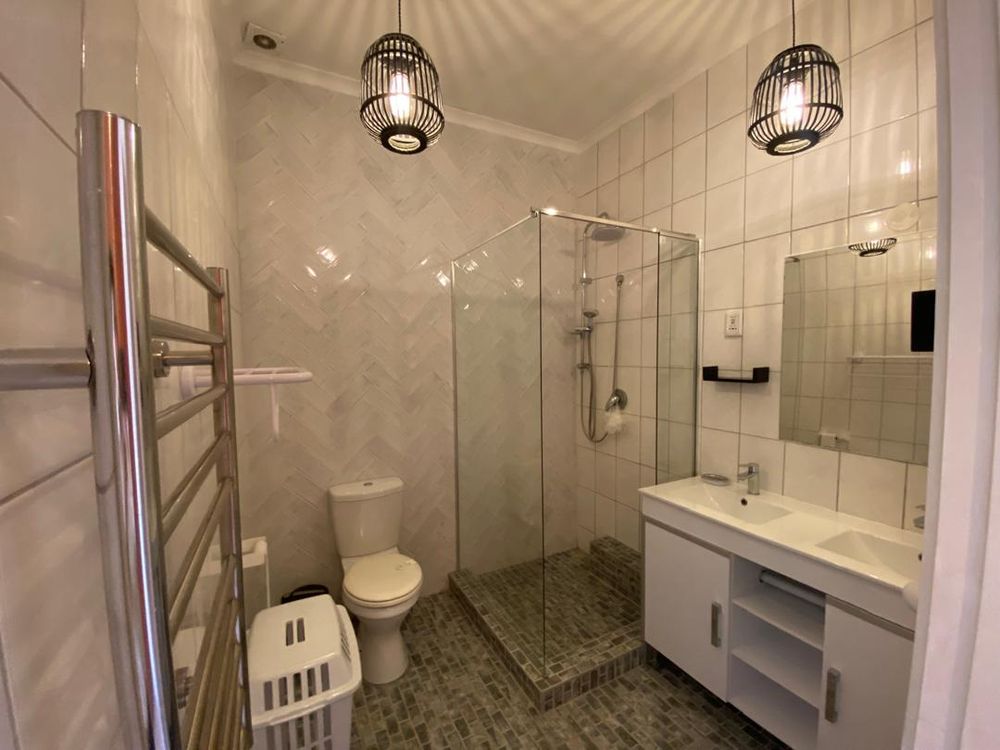 En-suite bathroom with heated towel railing