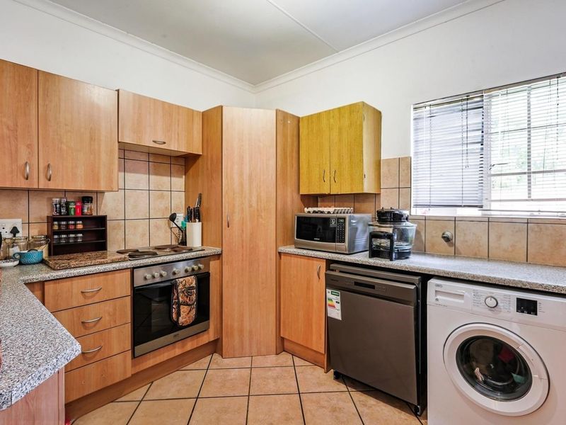 Your Dream Lifestyle Awaits! Secure, Stylish 2-Bed Townhouse in Prime Equestria! - Photo 9