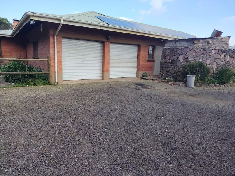 Level Smallholding with 4 Bedroom Home and Cottage | Renovation Opportunity with Endless Potential - Photo 5