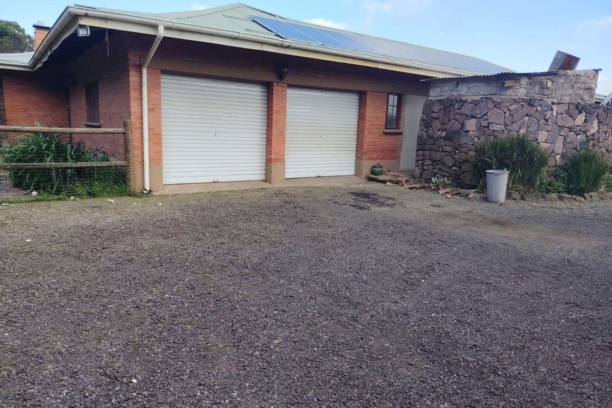 Level Smallholding with 4 Bedroom Home and Cottage | Renovation Opportunity with Endless Potential - Photo 5