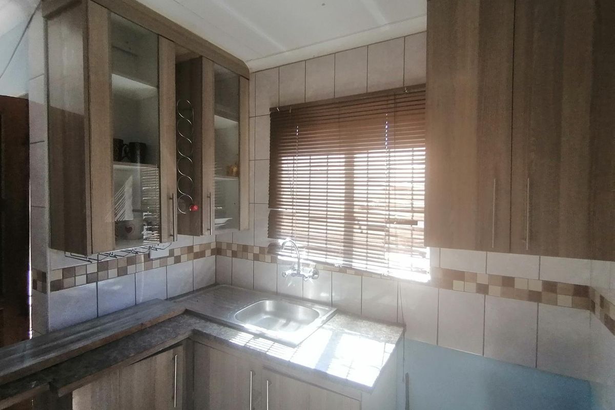 Charming 2-Bedroom Home for Sale in Sosh East - Photo 4