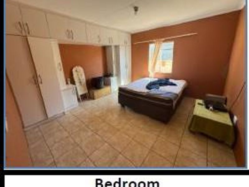 Charming Three-Bedroom Gem Awaits Your Touch - Photo 8