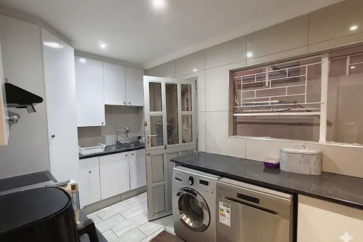 Modern Family Living in a Secure and Sought-After Complex - Photo 3