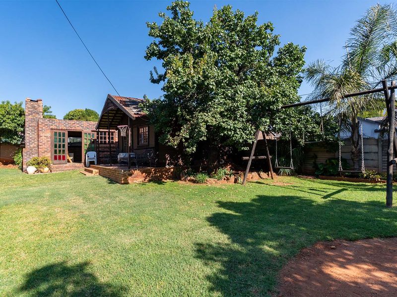 Spacious 5-Bedroom Family Home with Income-Generating Flatlet in Birch Acres - Photo 5