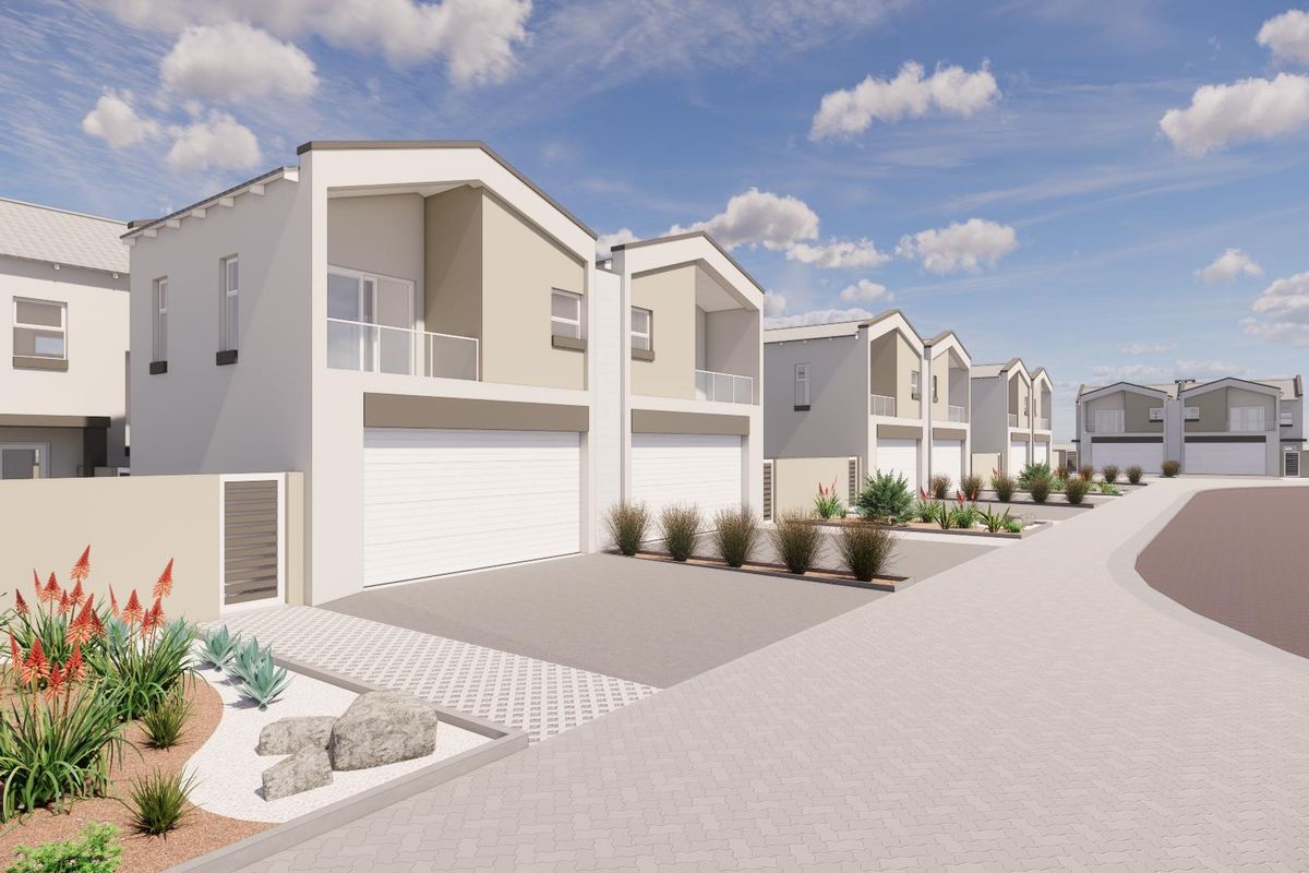 A perspective view of a modern townhouse development featuring paved driveways, integrated garages, and upper-level balconies.