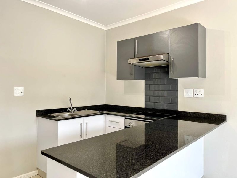 Elegant 2-Bed Apartment with Scenic Views in The Woods Estate - Photo 5