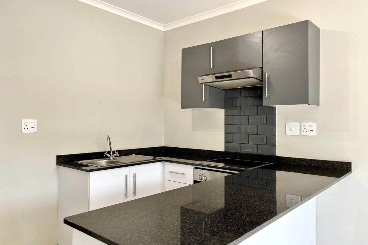 Elegant 2-Bed Apartment with Scenic Views in The Woods Estate - Photo 5