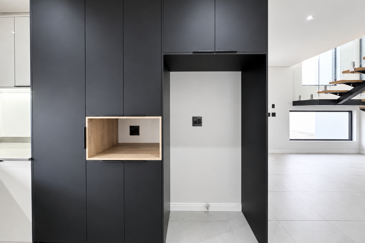 Striking Modern Home with Floating Staircase & Luxury Finishes in Sandown, Cape Town - Photo 5