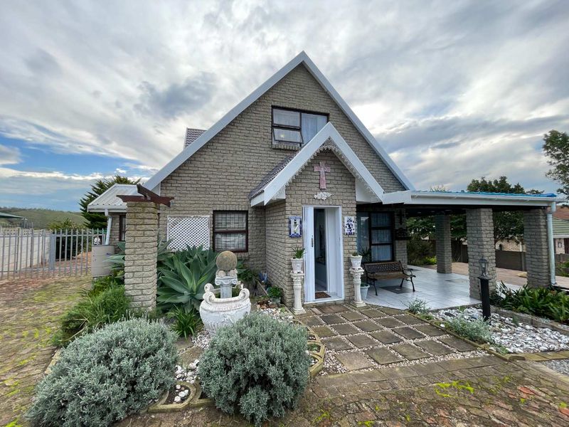 Prestigious Hartenbos Heuwels Home | 4 Bedrooms | Green Belt Views & Exceptional Privacy - Photo 1