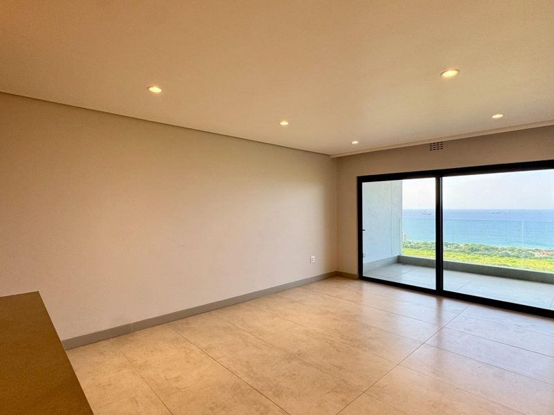 This is a premium, move-in-ready coastal apartment that combines luxury, security, and modern convenience in a sleek, never-before-lived-in space. - Photo 3