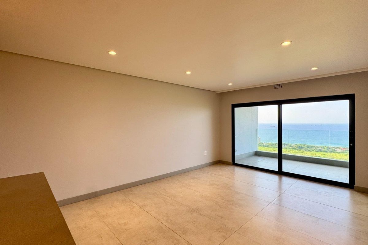 This is a premium, move-in-ready coastal apartment that combines luxury, security, and modern convenience in a sleek, never-before-lived-in space. - Photo 3