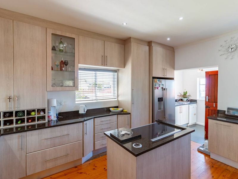 This beautifully renovated home offers modern comfort, excellent entertainment space, and valuable off-grid features — a rare find in central Adcockvale. - Photo 4