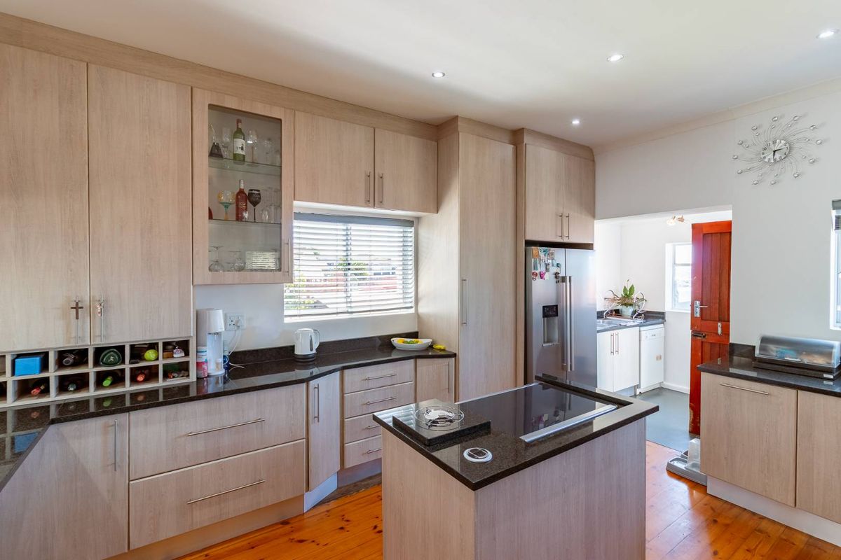 This beautifully renovated home offers modern comfort, excellent entertainment space, and valuable off-grid features — a rare find in central Adcockvale. - Photo 4