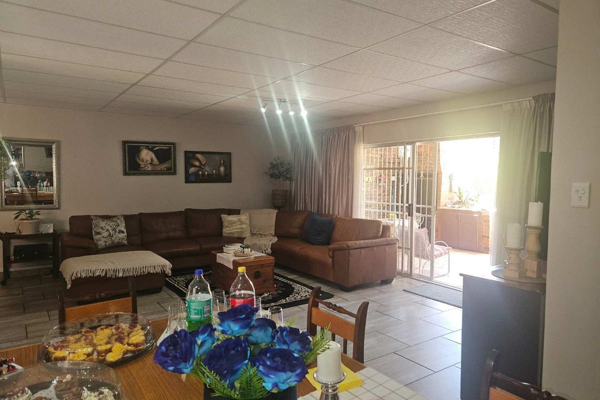 Charming Face-Brick Family Home with Modern Amenities and Exceptional Security - Photo 4