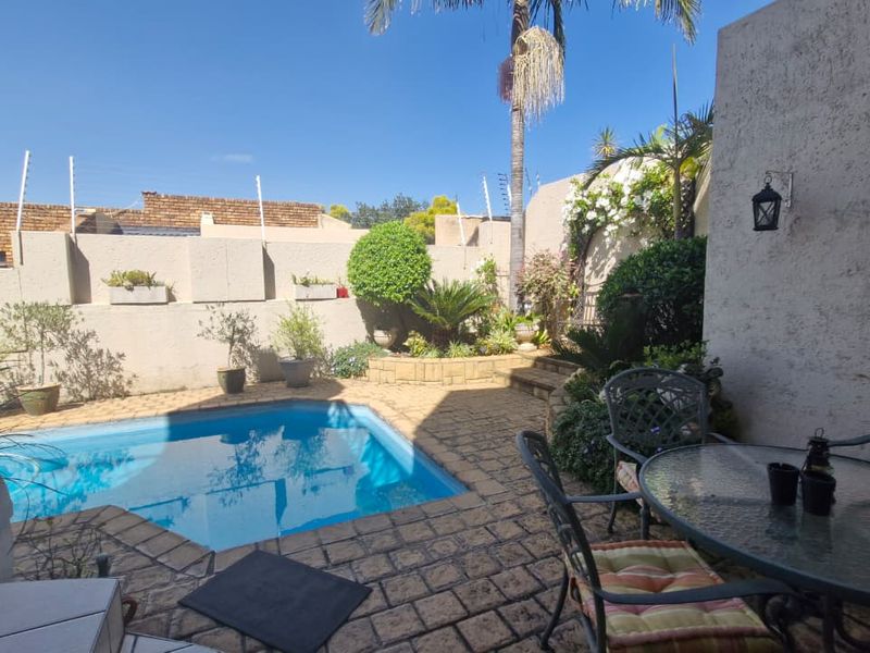 Luxury Awaits: Secure Home with Pool & Staff Quarters! - Photo 9