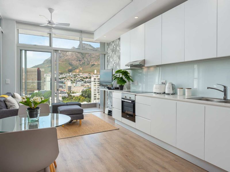 Turnkey 13th Floor Apartment | Skyline Framed by Iconic Table Mountain - Photo 5