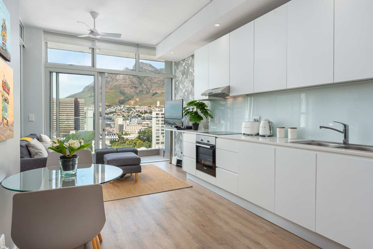 Turnkey 13th Floor Apartment | Skyline Framed by Iconic Table Mountain - Photo 5