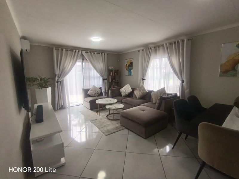 1. "Discover Your Dream Home in Mackenzie Palms!" 2. "Luxurious Living Awaits in This 3-Bedroom Gem!" 3. "Modern Comfort Meets Security in Mackenzie Palms!" 4. - Photo 6