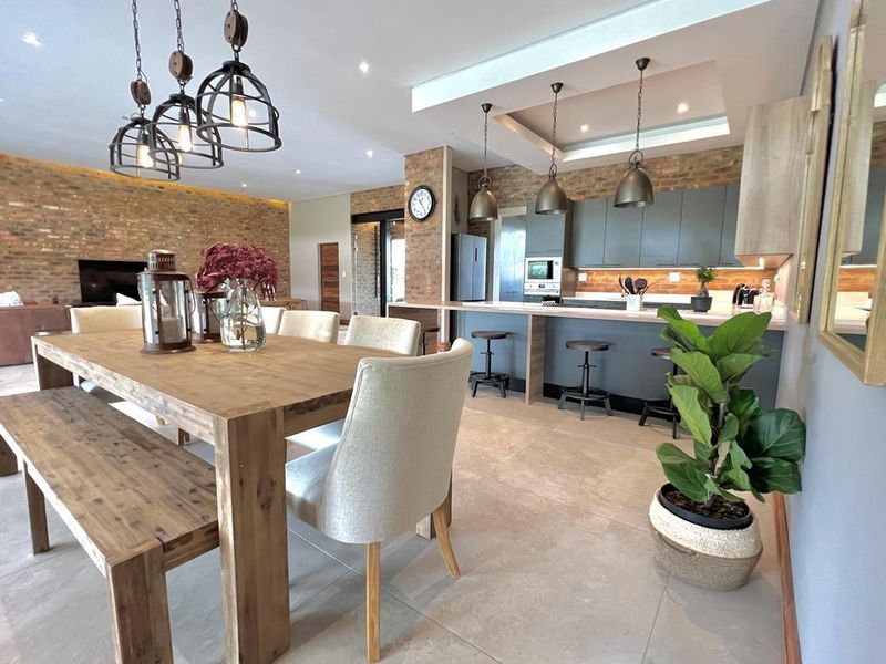 INCOME GENERATING HOME Welcome to this charming 4 bedroom home nestled within Highland Gate Golf Estate - Photo 4