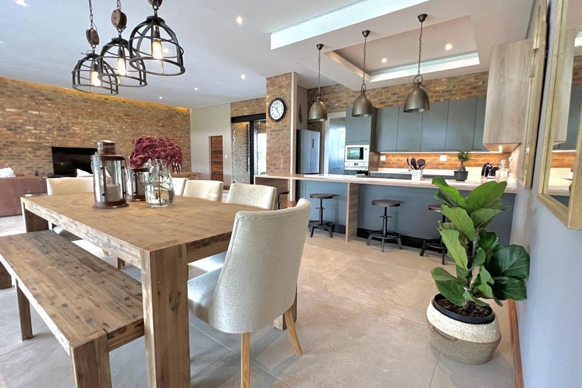INCOME GENERATING HOME Welcome to this charming 4 bedroom home nestled within Highland Gate Golf Estate - Photo 4