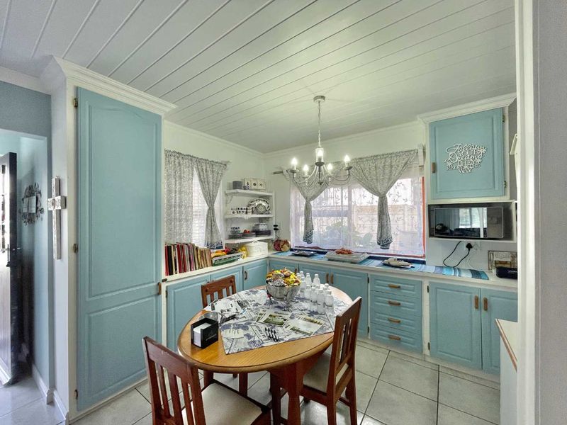 Prestigious Hartenbos Heuwels Home | 4 Bedrooms | Green Belt Views & Exceptional Privacy - Photo 9