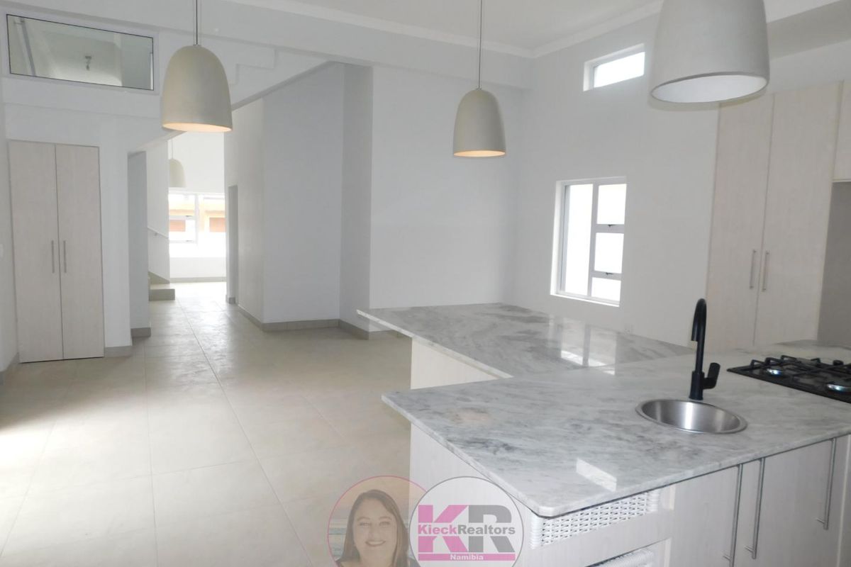 A few steps from the beach - Photo 3