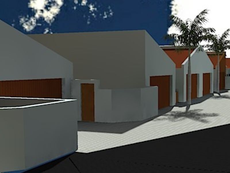 A digital rendering showing the front exterior view of the townhouse complex, featuring garage access and paved driveway areas.