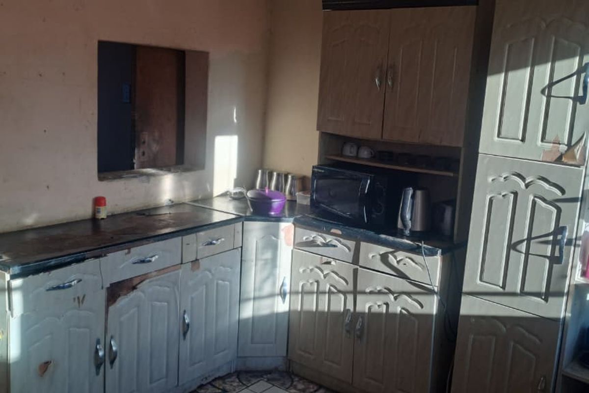 Peaceful 3-Bedroom Family Home with 2 Rondavels for Extra Income Potential - Photo 2