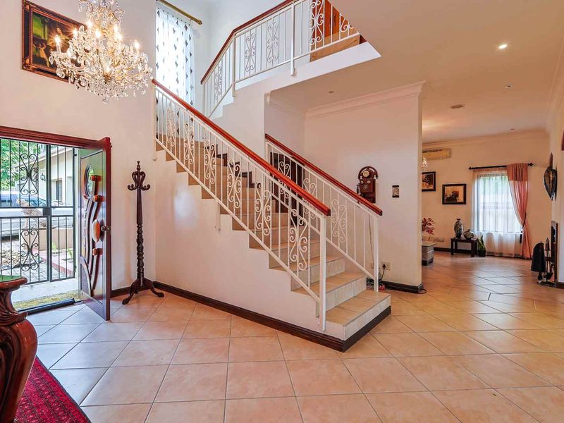 This spacious fully furnished 4-bedroom, 3.5-bathroom home offers comfortable family living with generous entertainment areas and modern conveniences. - Photo 4