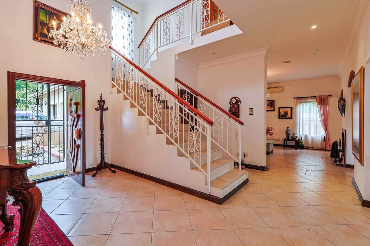 This spacious fully furnished 4-bedroom, 3.5-bathroom home offers comfortable family living with generous entertainment areas and modern conveniences. - Photo 4