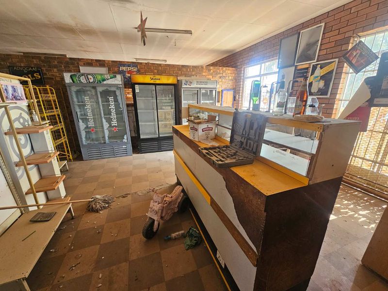 Versatile Commercial Property with Retail and Warehouse Buildings and Cold Storage - Photo 5