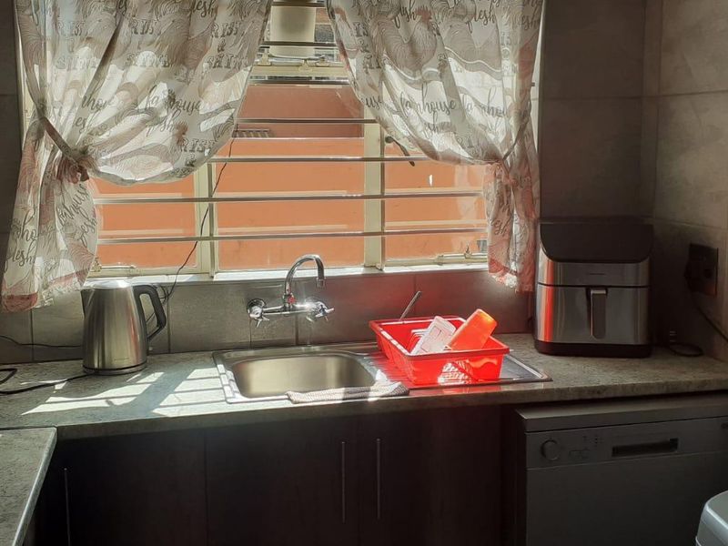 Secure, Stylish Living in Raceview - Photo 10