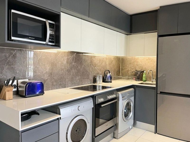 FULLY FURNISHED APARTMENT AT THE CAPITAL AVAILABLE - Photo 3