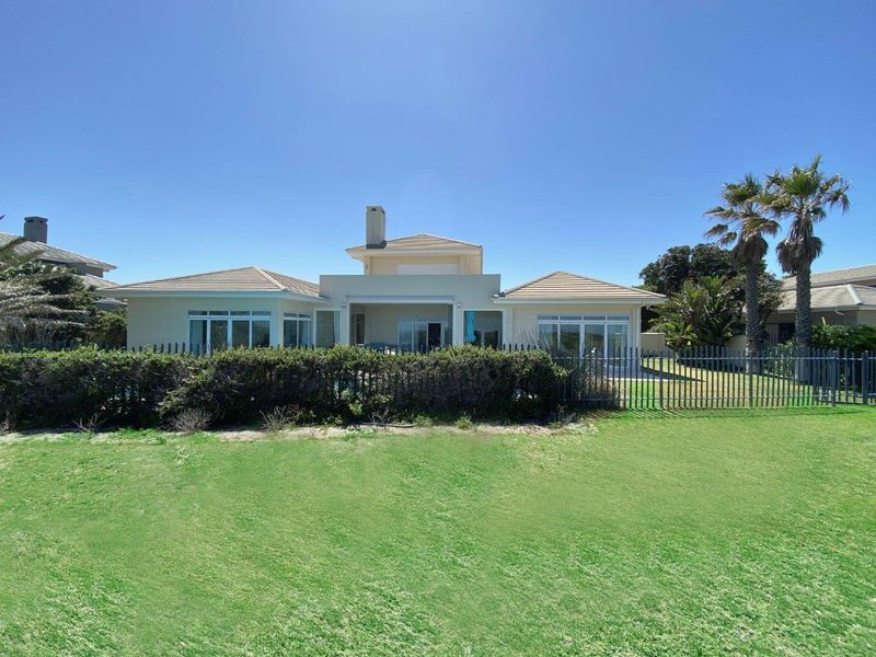 Fully Furnished Luxury beachfront home in Sunset Links Golf Estate - Photo 2