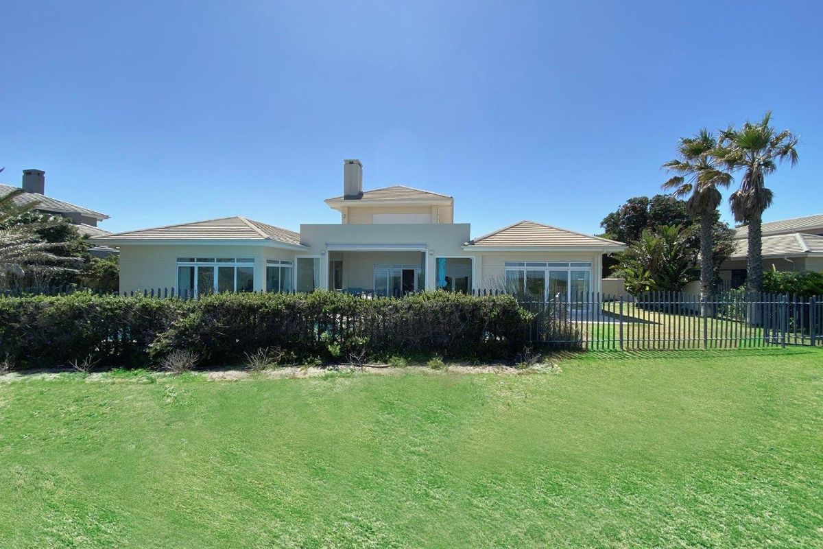 Fully Furnished Luxury beachfront home in Sunset Links Golf Estate - Photo 2