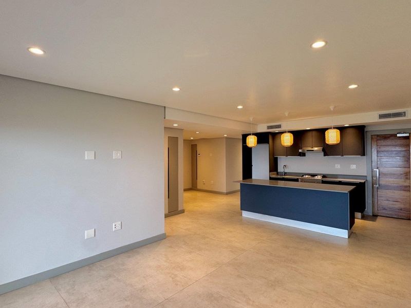 This is a premium, move-in-ready coastal apartment that combines luxury, security, and modern convenience in a sleek, never-before-lived-in space. - Photo 5