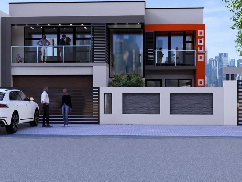A modern two-story residential facade featuring clean lines, a balcony with glass balustrades, and a secure gated entrance.