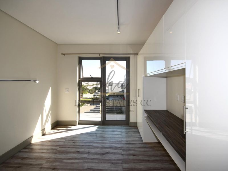 Safe and Low-Maintenance Retirement Oasis! - Photo 9