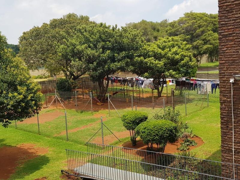 Cozy 2nd-Floor Unit Near Gautrain with Secure Parking - Photo 8