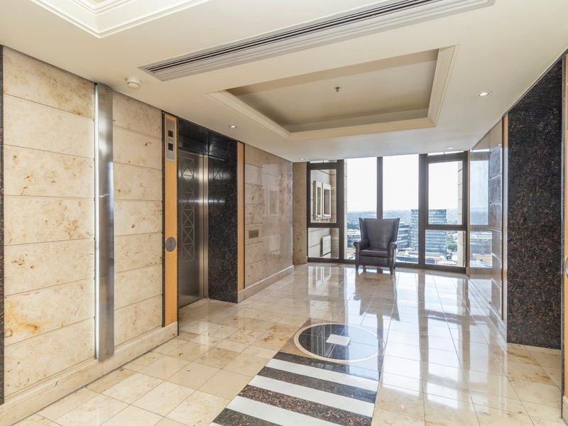 SOPHISICATED AND LUXURIOUS FULLY FURNISHED 1 BED APARTMENT IN THE MICHELANGELO TOWERS. - Photo 2