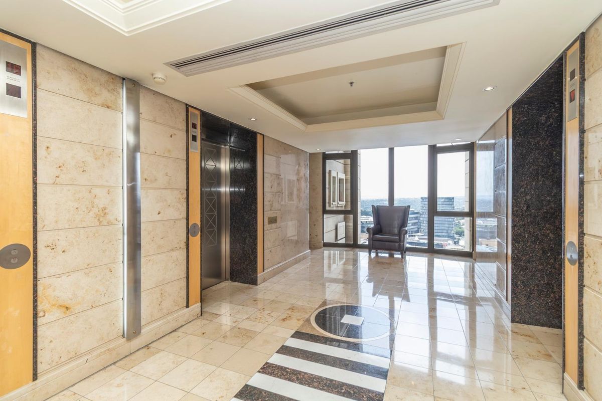 SOPHISICATED AND LUXURIOUS FULLY FURNISHED 1 BED APARTMENT IN THE MICHELANGELO TOWERS. - Photo 2