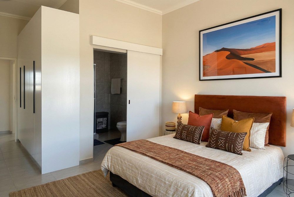 Main bedroom with plenty of built-in cupboards and ensuite bathroom.