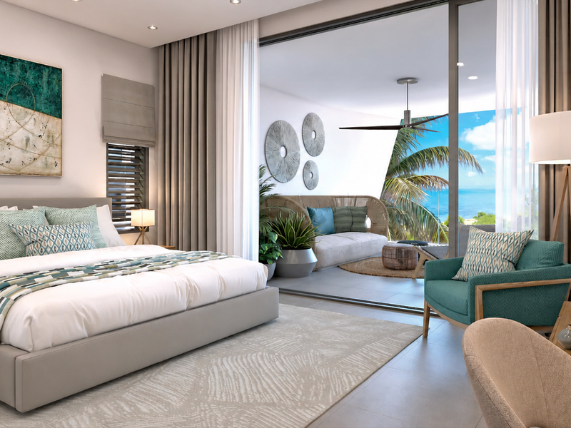 A modern, well-appointed bedroom featuring large sliding glass doors that open onto a private balcony with scenic views.