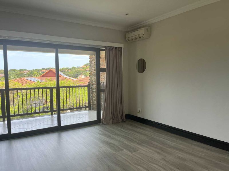Experience exclusive coastal living in this luxurious, lock-up-and-go apartment within the prestigious Zimbali Coastal Resort. - Photo 10