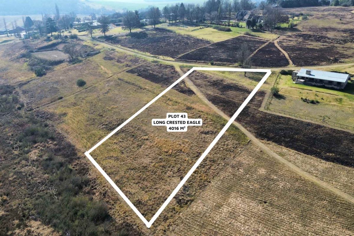 An aerial view of a 4016 square meter vacant residential plot, highlighting the property boundaries and surrounding landscape.