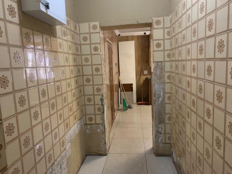 Charming 4-Bedroom Home with Additional Cottages in Rosettenville Rental Income R24k - Photo 6